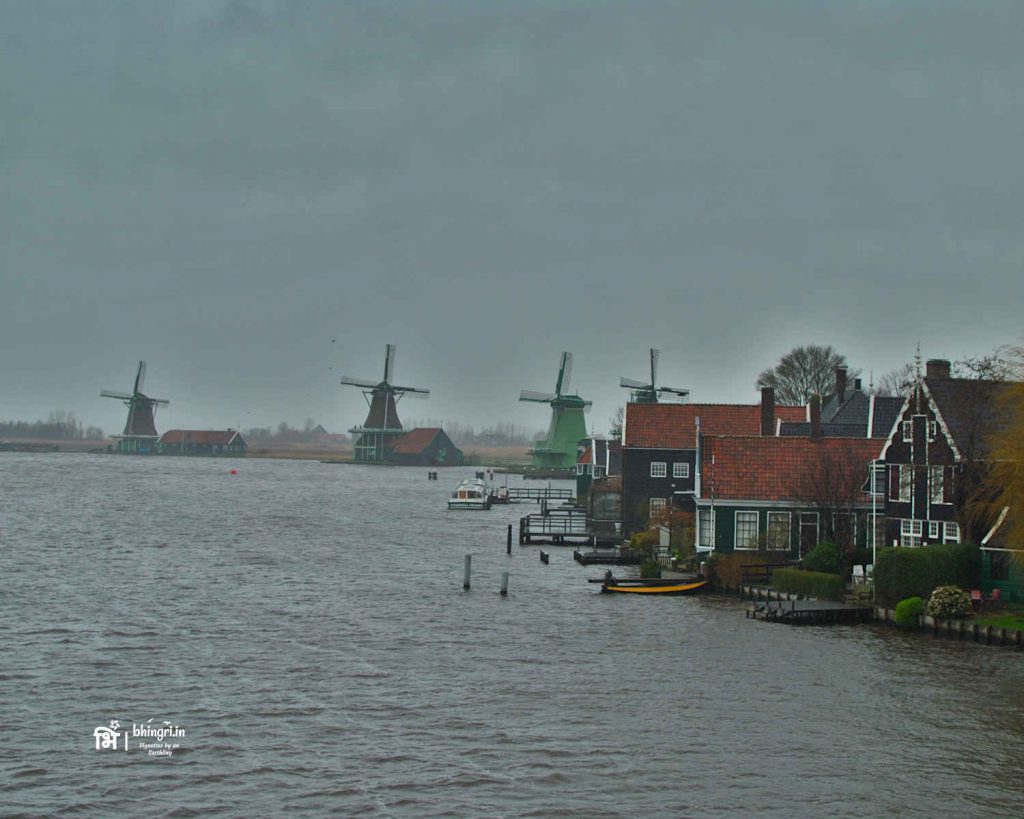 Zaanse Schans, a tiny village famous for historic windmills on the banks of river Zaan